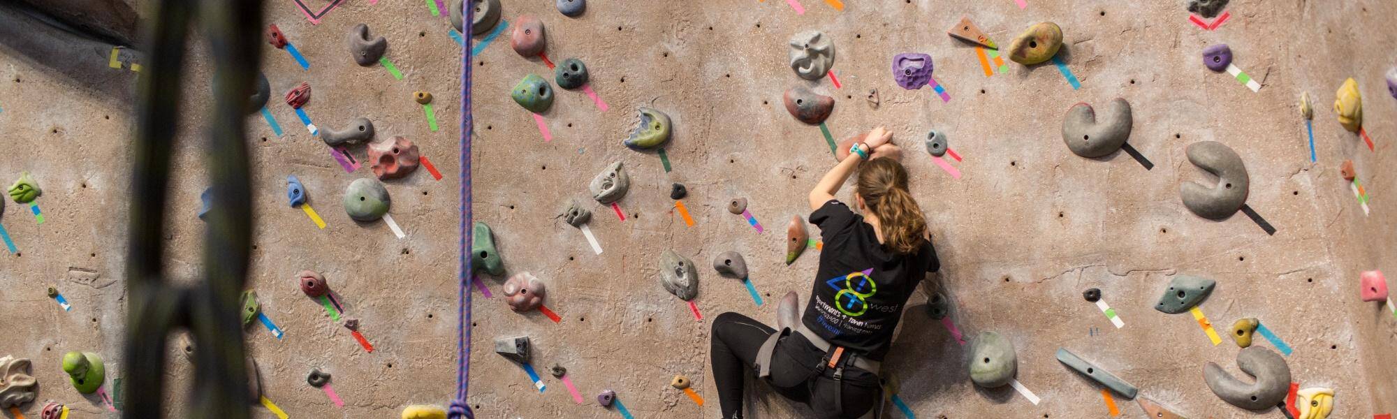 person on indoor climbing wall